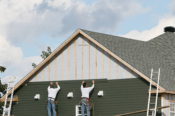 Professional Storm Damage Siding Repair technician working in Quinton, VA